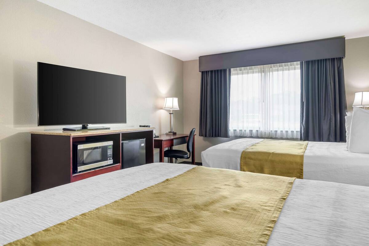 standard room, 2 queen beds, non smoking, refrigerator & microwave | pillow-top beds, desk, laptop workspace, blackout curtains