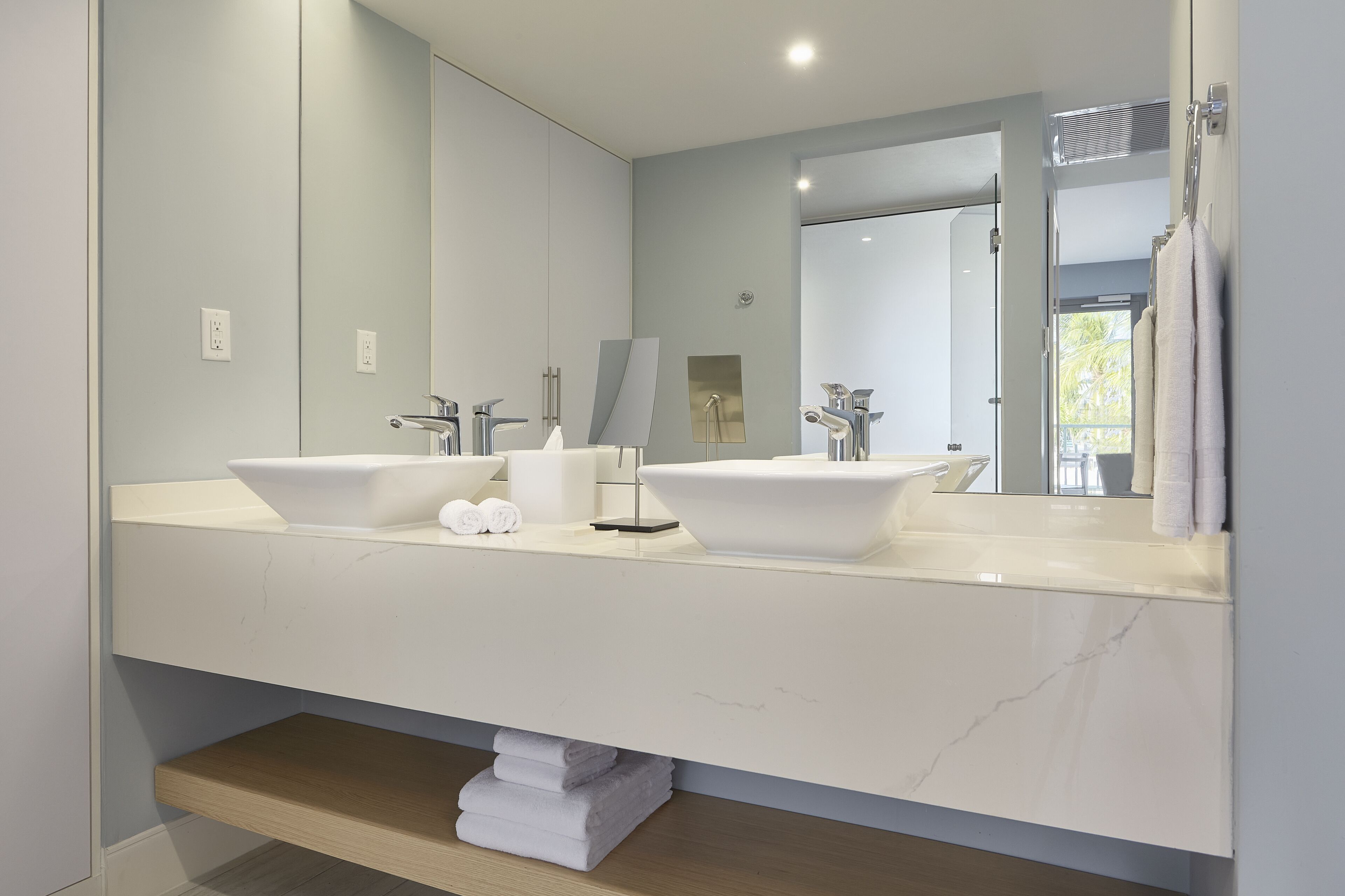 shower, rainfall showerhead, hair dryer, towels