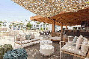 Breakfast, lunch, dinner served; international cuisine, pool views 