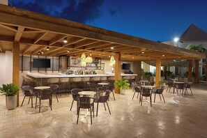 Breakfast, lunch, dinner served; international cuisine, pool views 