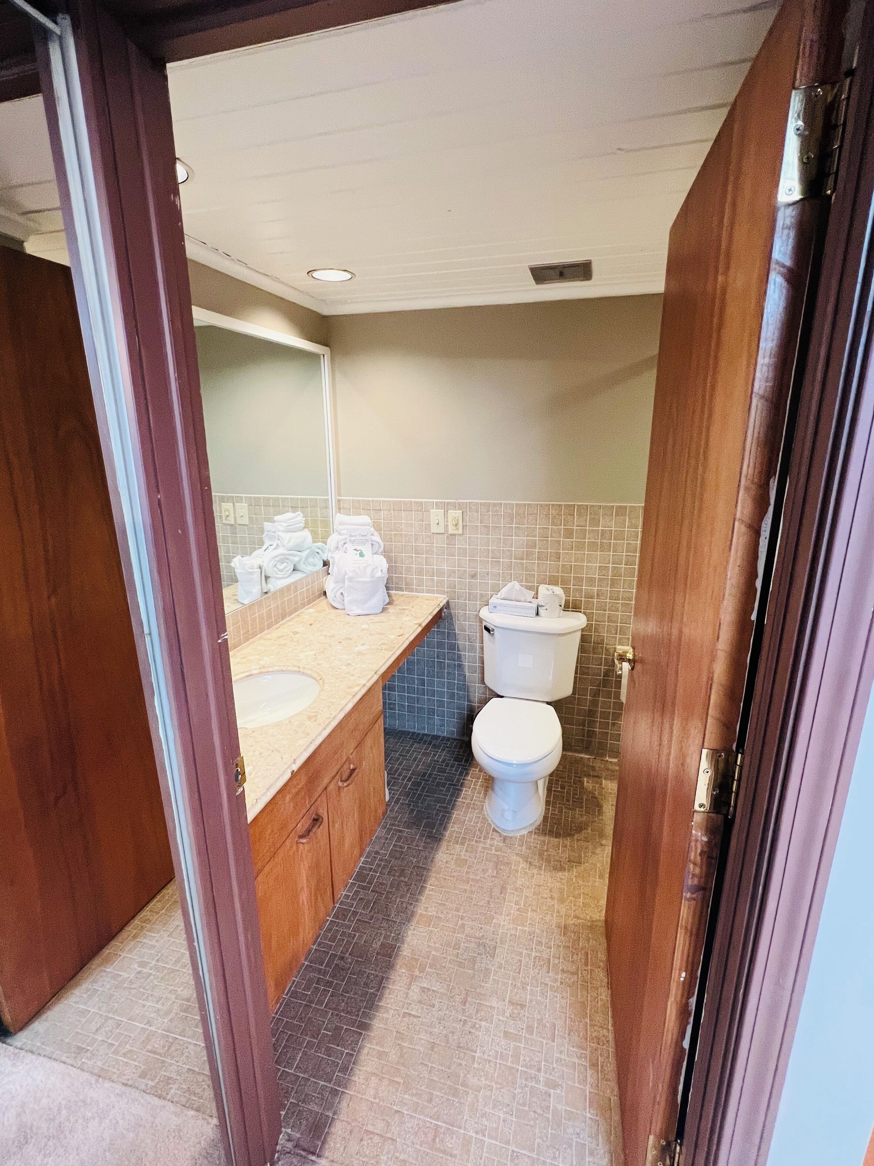 room, 1 king bed | bathroom | hair dryer, towels