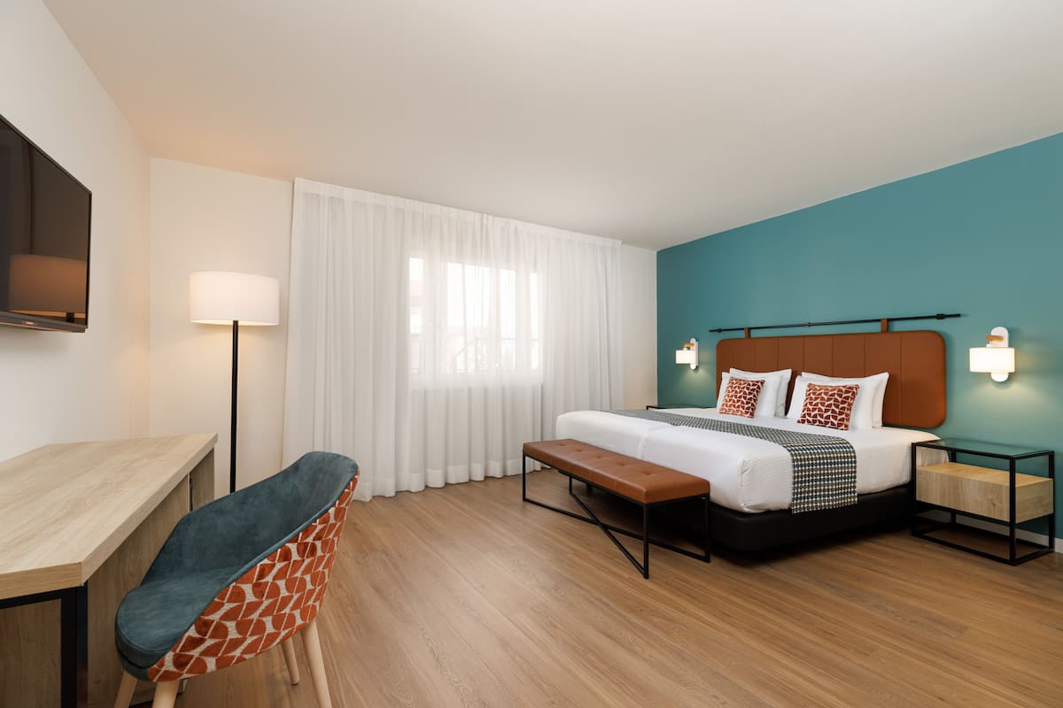 1 habitación, ropa de cama hipoalergénica y minibar