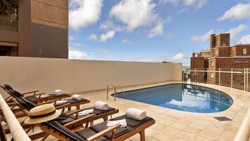 Outdoor pool, sun loungers