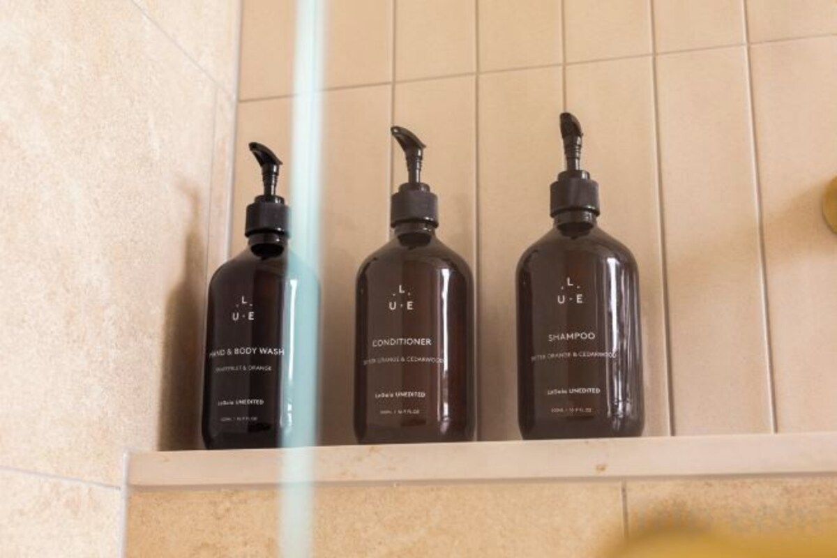 Bathroom amenities | Shower, designer toiletries, hair dryer, bathrobes
