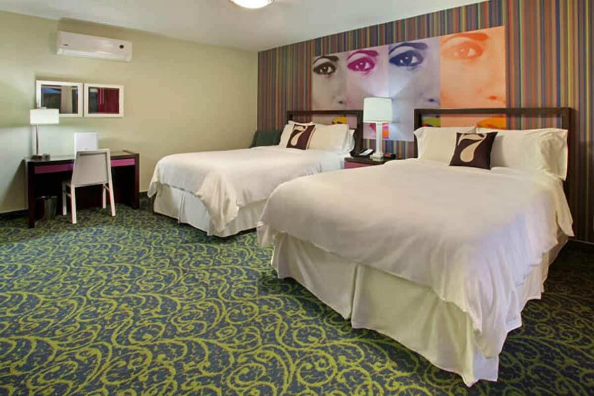 Deluxe Room, 2 Queen Beds | Premium bedding, pillowtop beds, in-room safe, blackout drapes