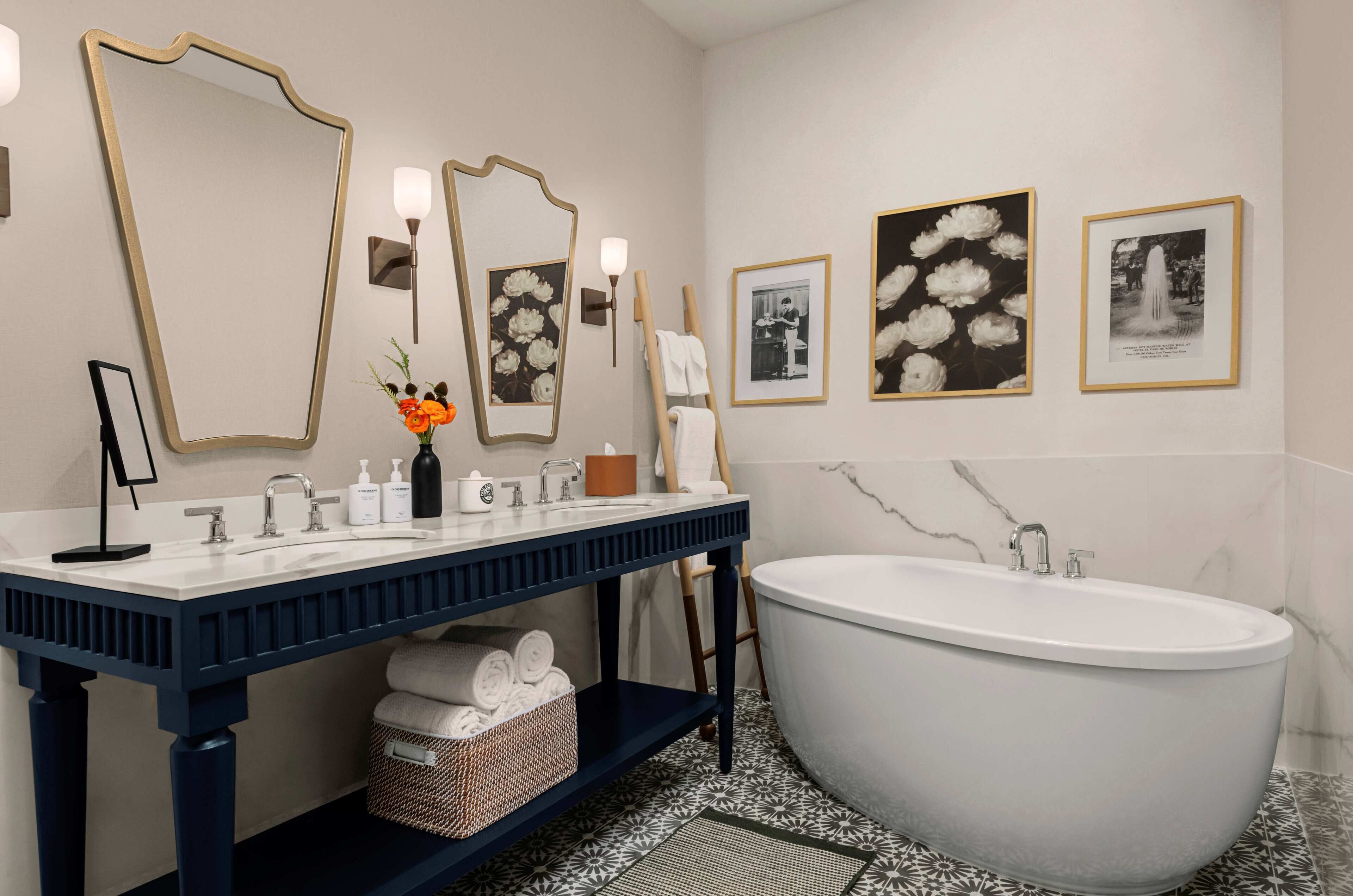 designer toiletries, hair dryer, towels