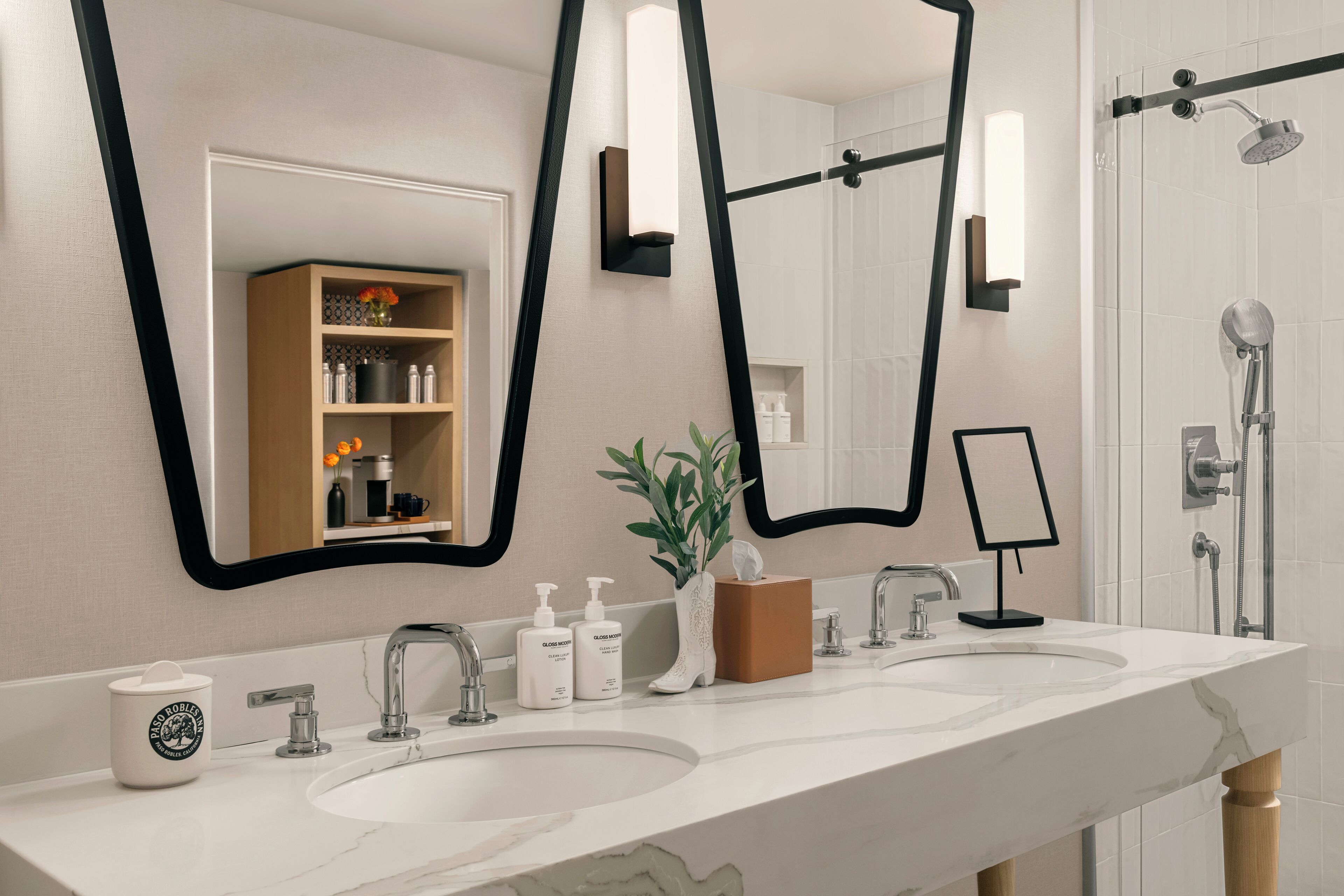 designer toiletries, hair dryer, towels