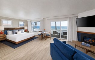 Suite, 1 cama de matrimonio grande con sofá cama (Boardwalk King Suite) | Cortinas opacas, tabla de planchar con plancha, cunas gratuitas
