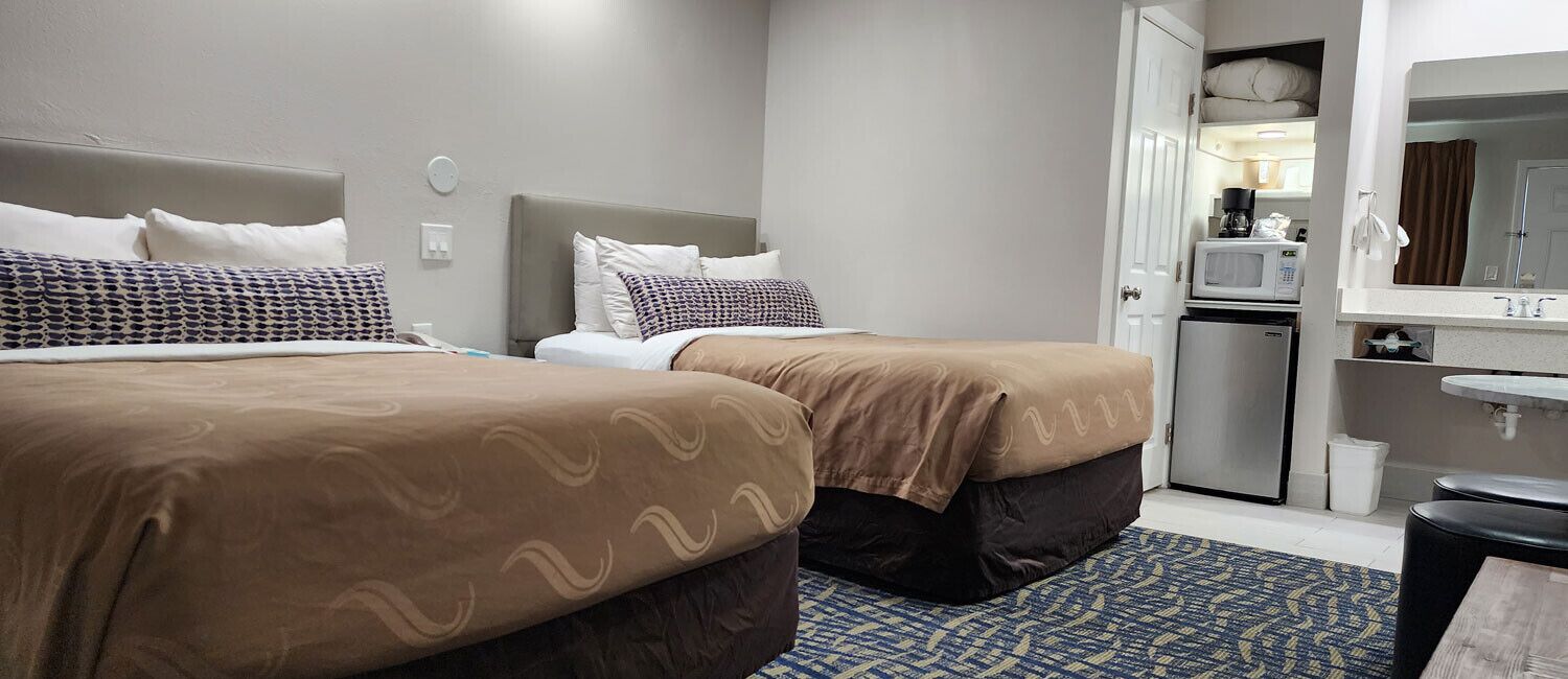Standard Double Room, 2 Double Beds, Non Smoking | Premium bedding, blackout drapes, iron/ironing board, free WiFi