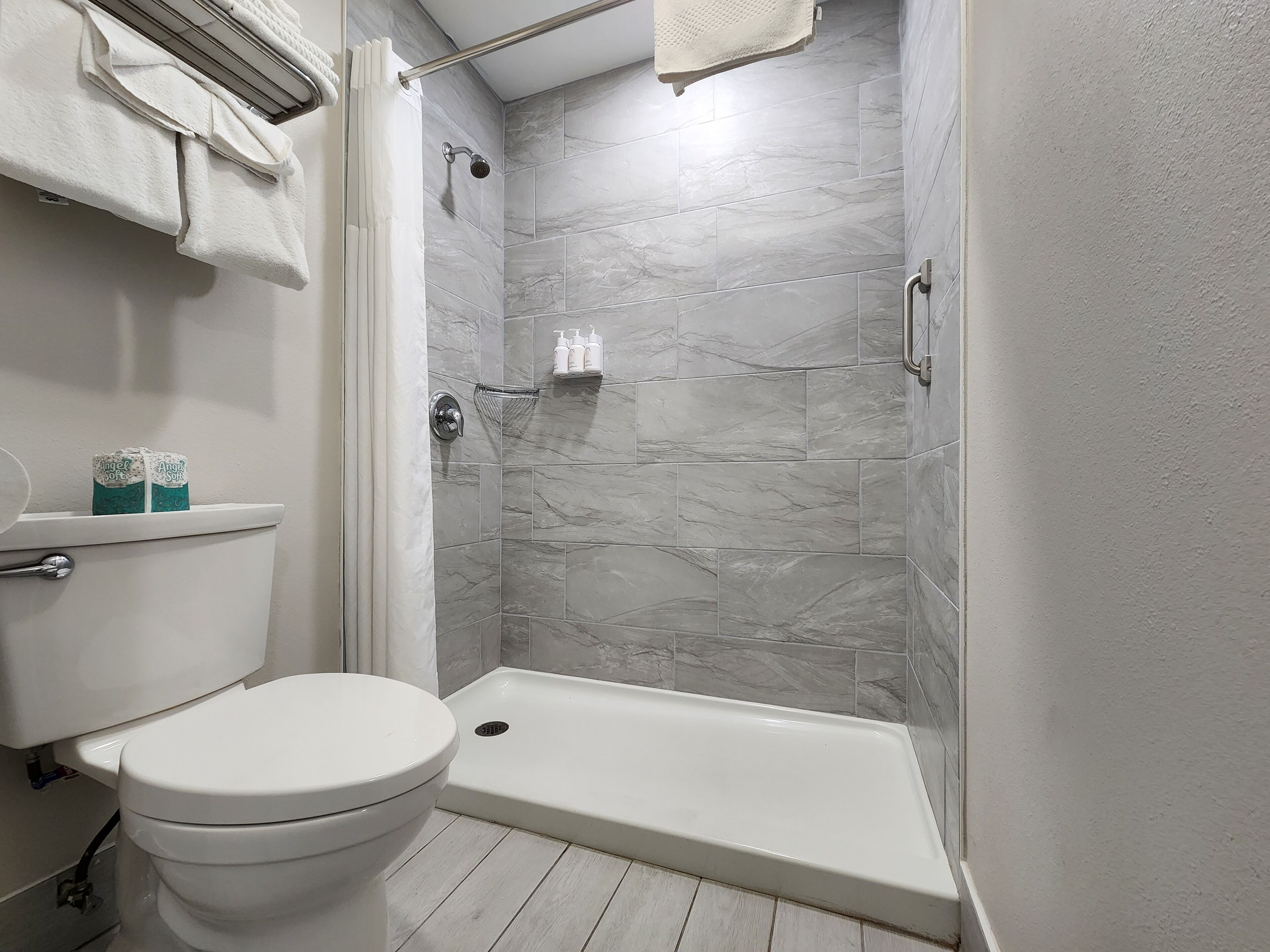 Shower, free toiletries, hair dryer, towels