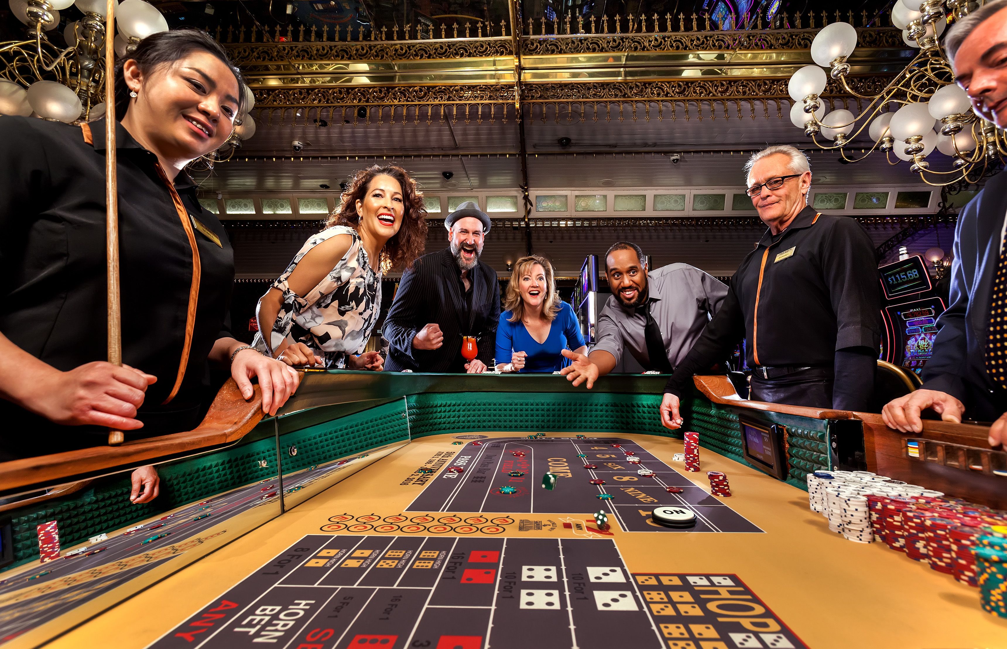 A casino blackjack table with chips and cards.