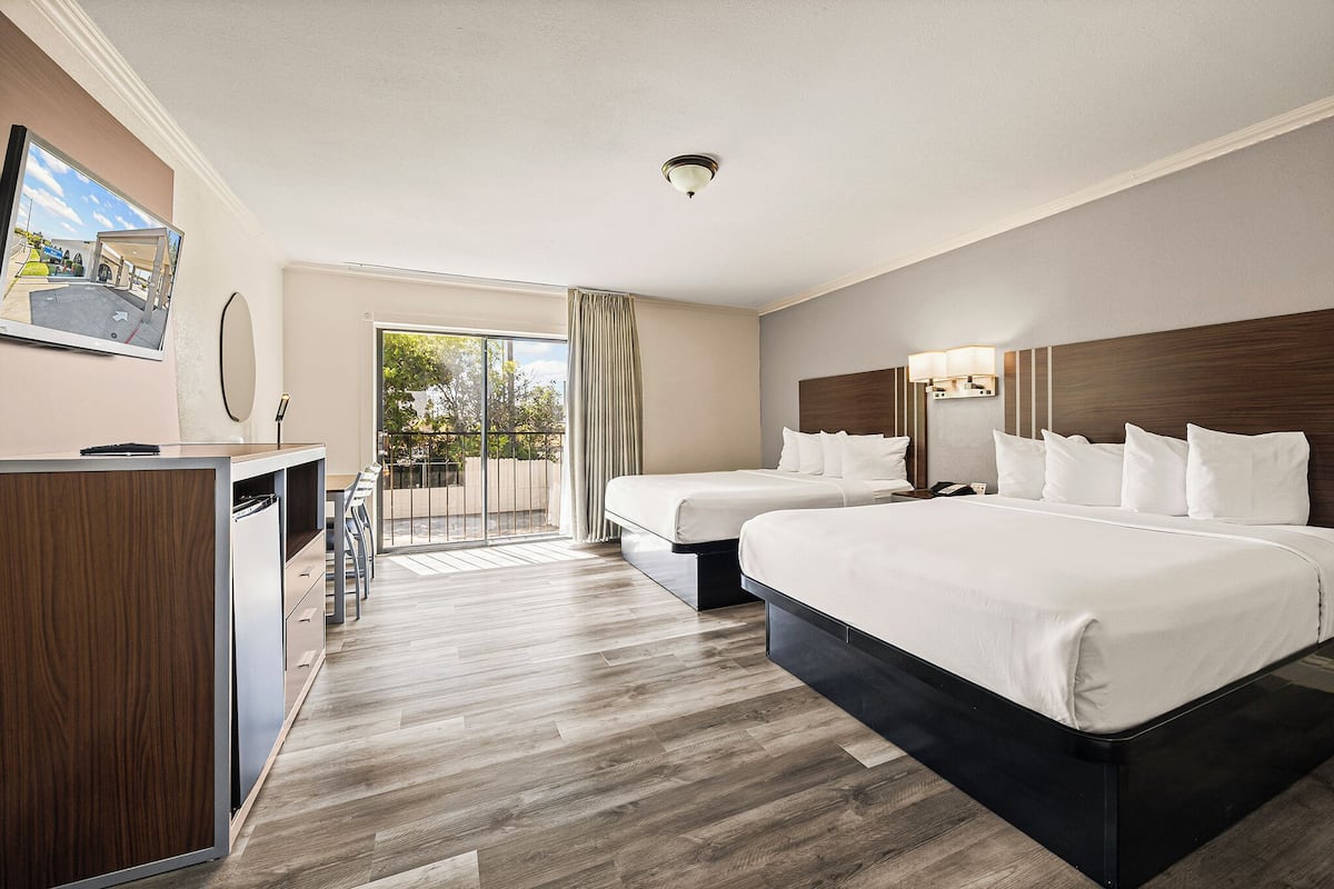 Standard Room, 2 Queen Beds, Non Smoking | Laptop workspace, blackout drapes, iron/ironing board, free WiFi