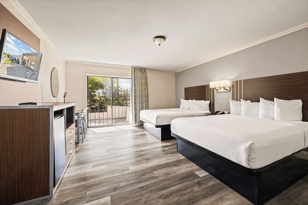Standard Room, 2 Queen Beds, Non Smoking | Laptop workspace, blackout drapes, iron/ironing board, free WiFi