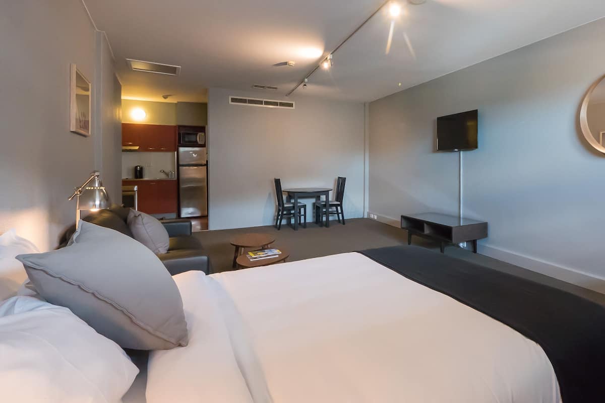 Desk, blackout drapes, soundproofing, iron/ironing board