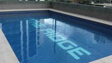 Outdoor pool, open 6:00 AM to 10:00 PM, sun loungers