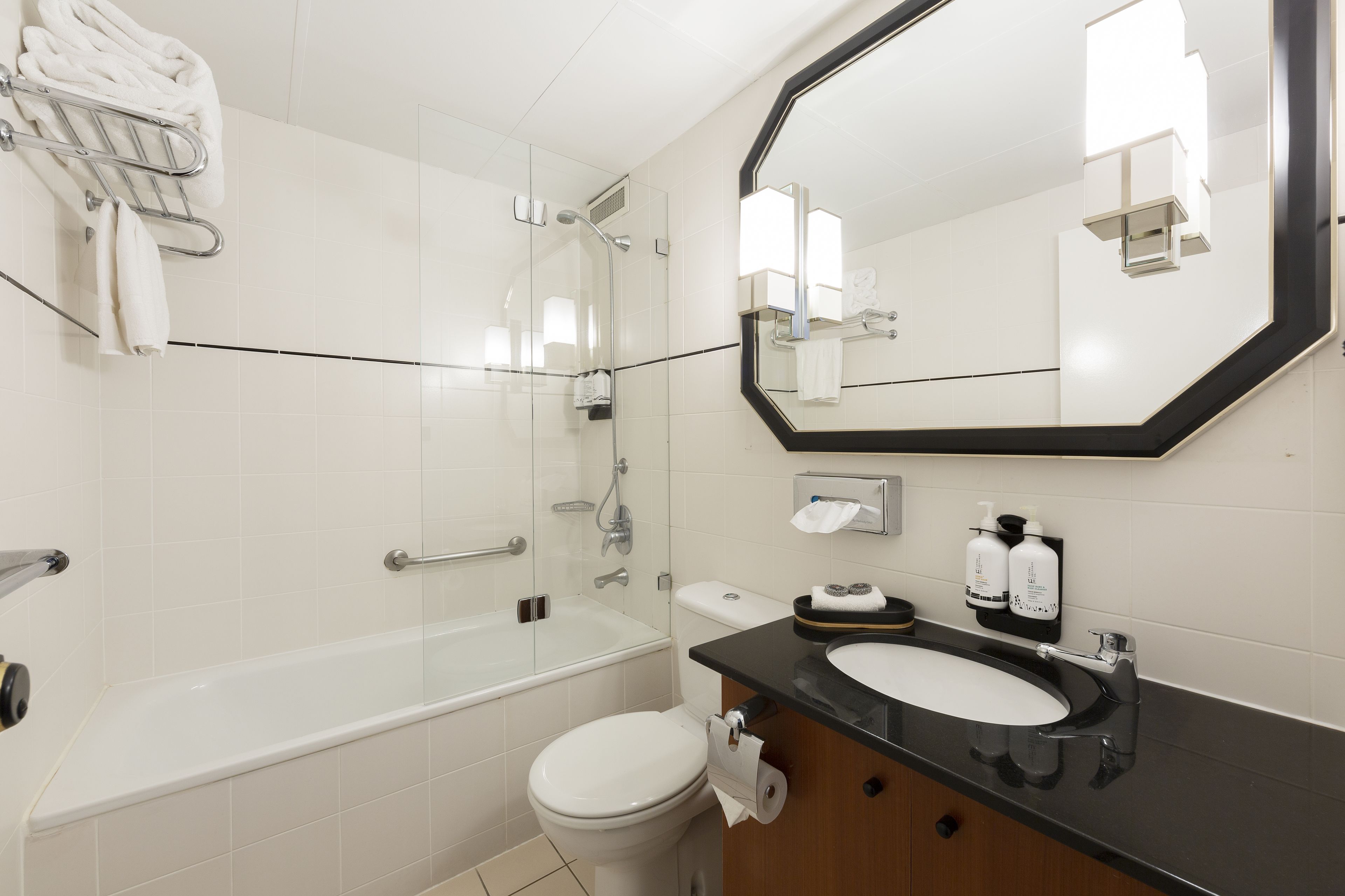standard twin room | bathroom | rainfall showerhead, designer toiletries, hair dryer, bathrobes