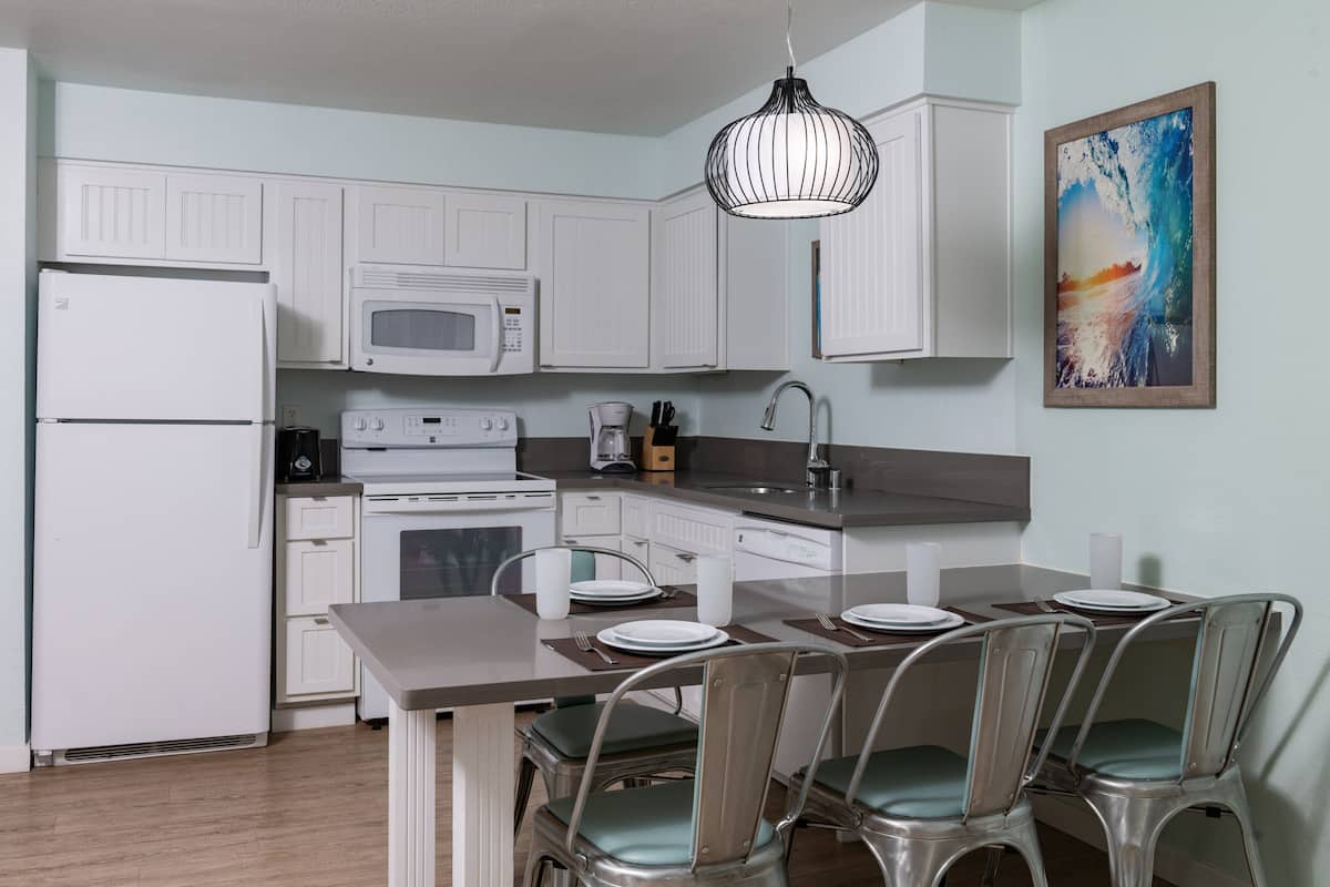 Standard Condo, 1 Bedroom, Kitchen | Minibar, iron/ironing board, WiFi, bed sheets