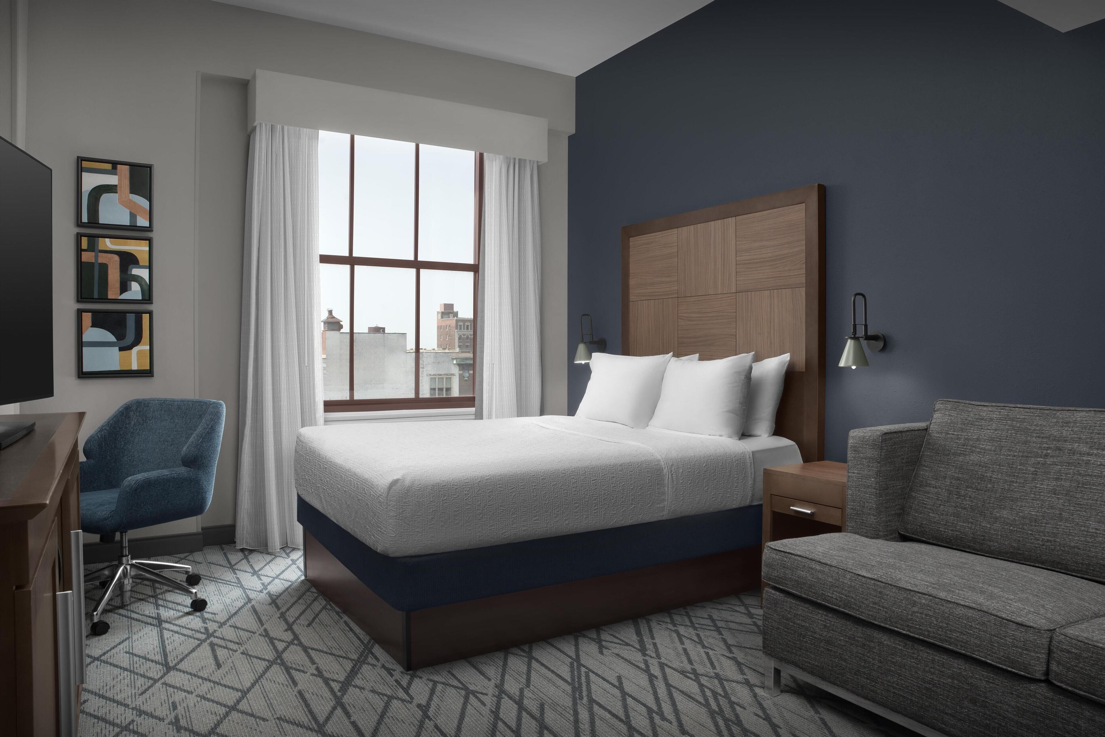 desk, blackout curtains, iron/ironing board, free cots/infant beds