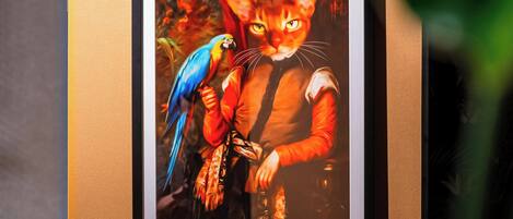 A framed artwork on a wall.