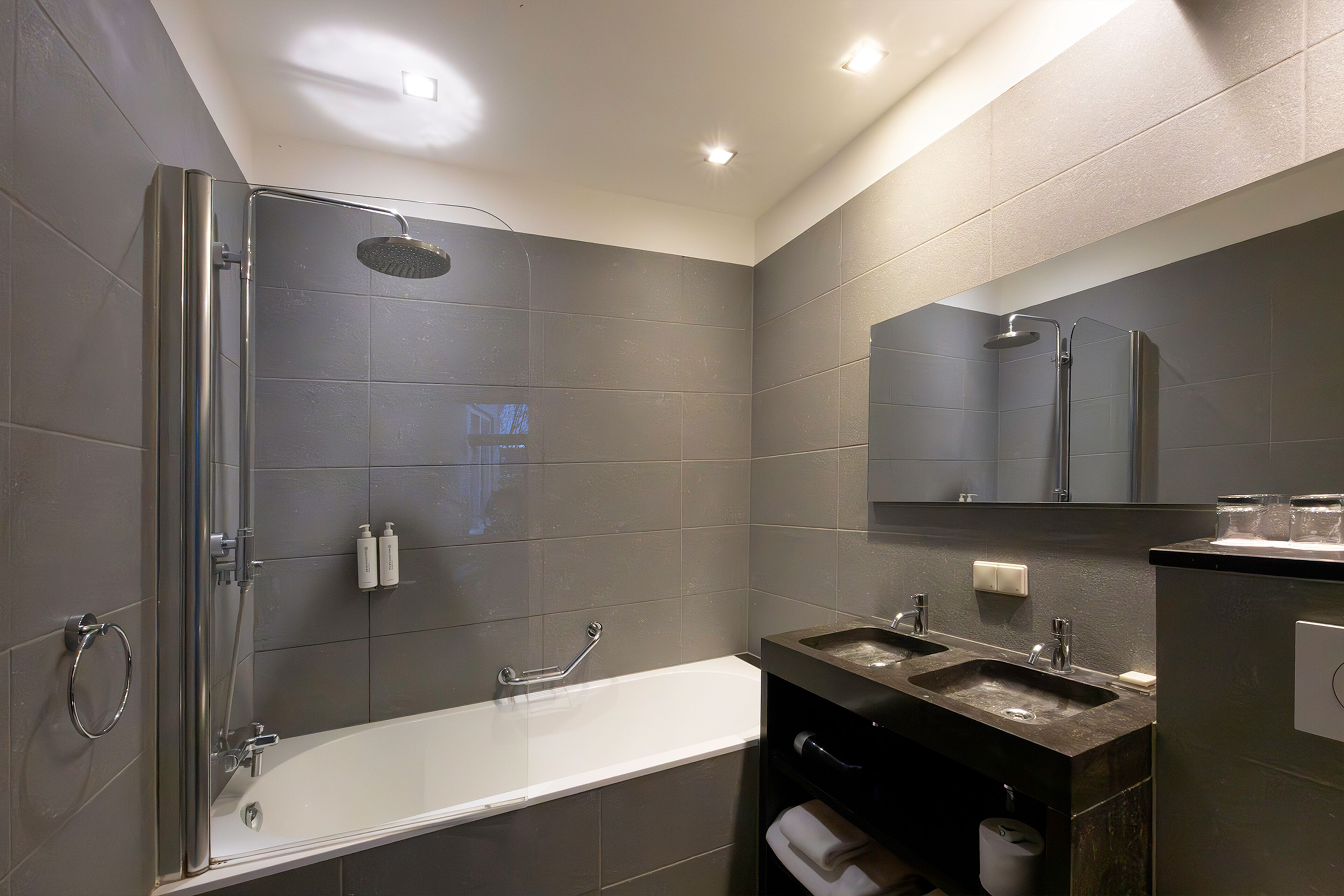 eco-friendly toiletries, hair dryer, towels, soap