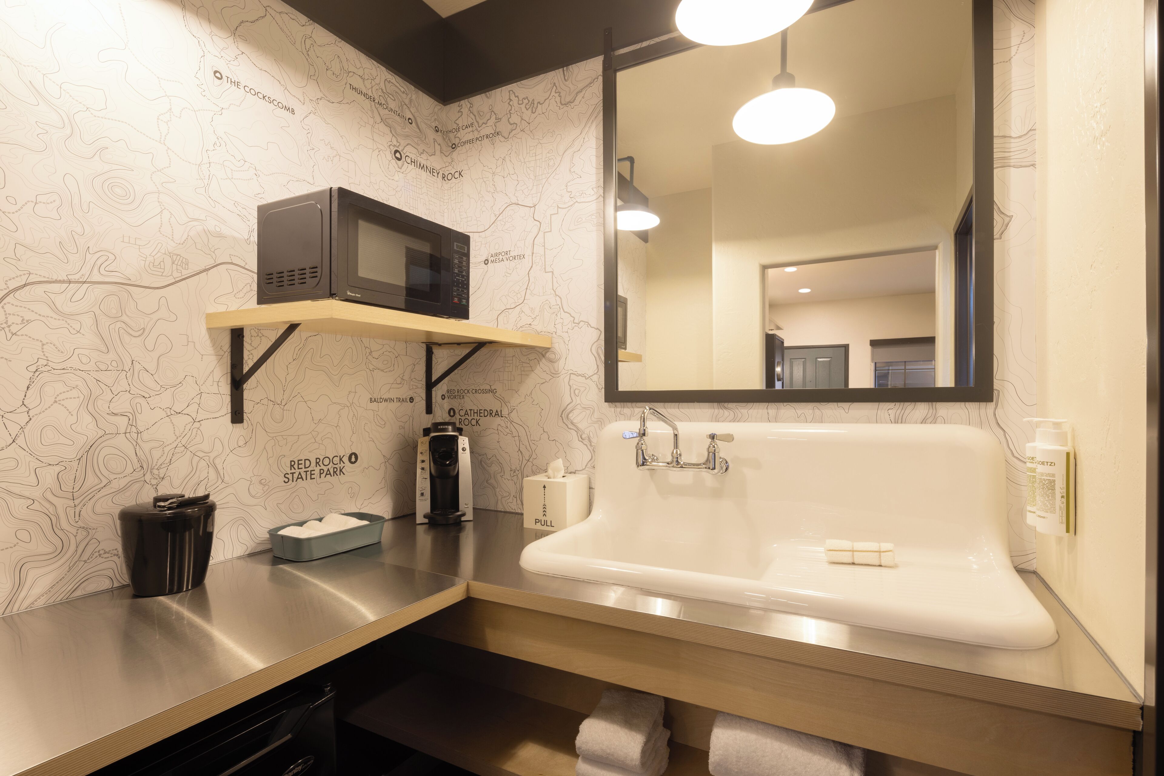 eco-friendly toiletries, hair dryer, towels, soap