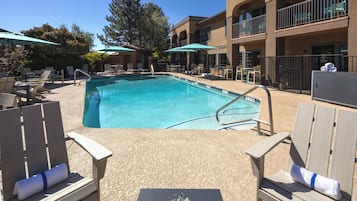 Outdoor pool, open 7:00 AM to 10:00 PM, pool umbrellas, sun loungers