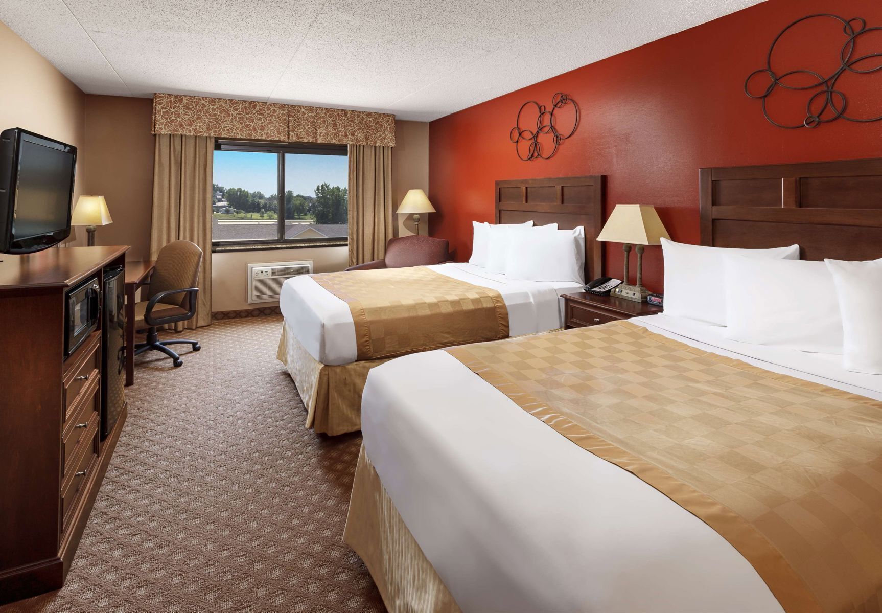 Pillow-top beds, desk, laptop workspace, blackout curtains