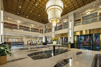 Hotel entrance and lobby at NEW YORKER BY LOTTE HOTELS