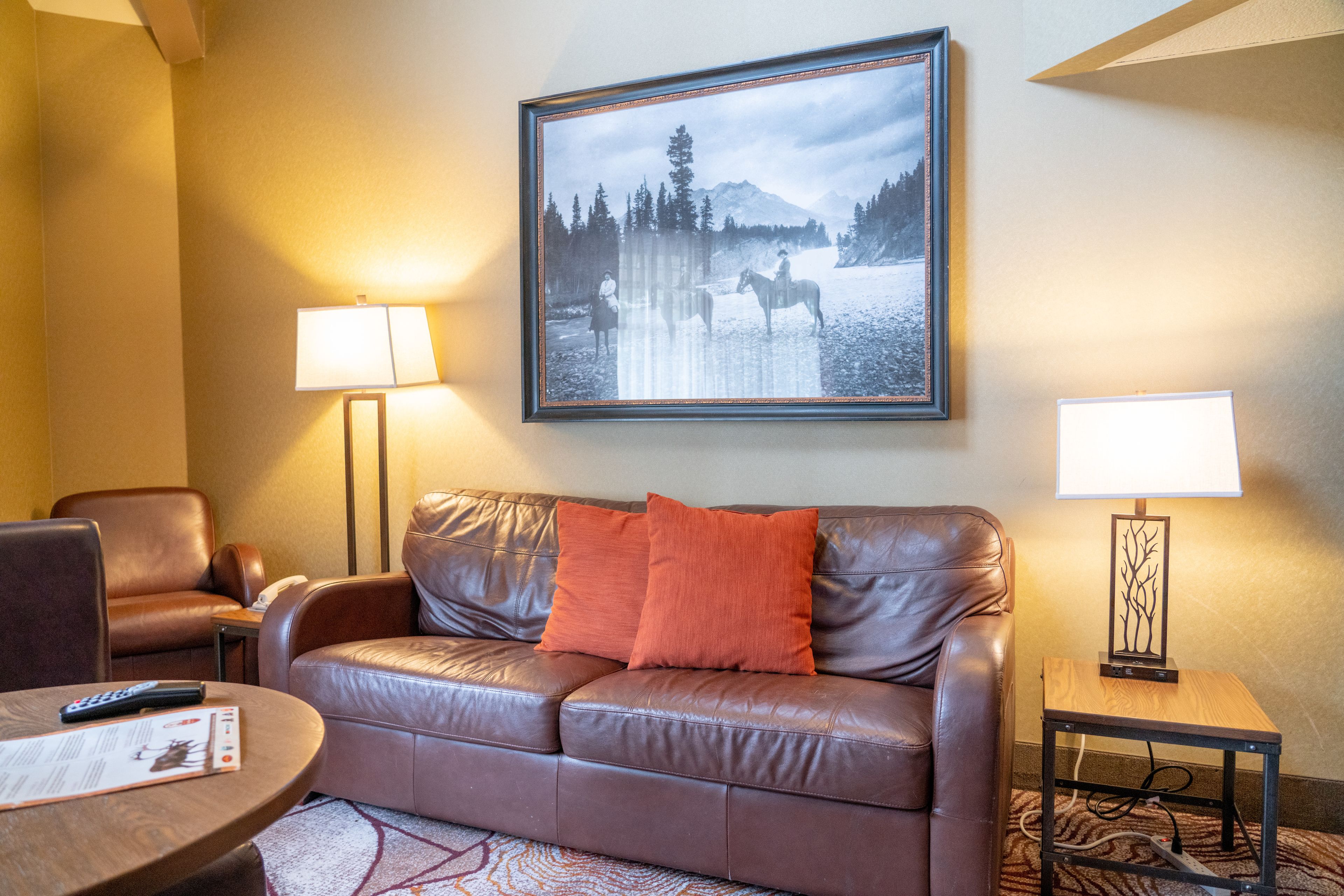 corner suite with spa bath | living room | flat-screen tv