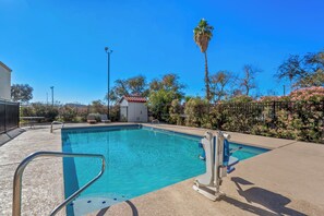 Outdoor pool, open 8 AM to 10 PM, pool umbrellas, pool loungers