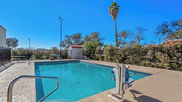 Outdoor pool, open 8 AM to 10 PM, pool umbrellas, sun loungers