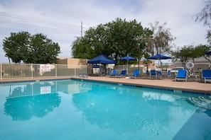 Outdoor pool, open 7:00 AM to 10:00 PM, pool loungers