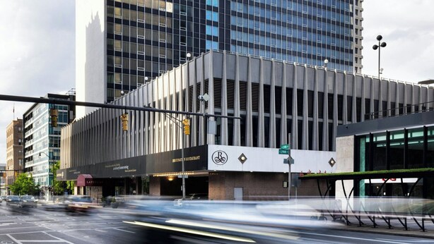 A modern building with the name 'RENAISSANCE' prominently displayed.