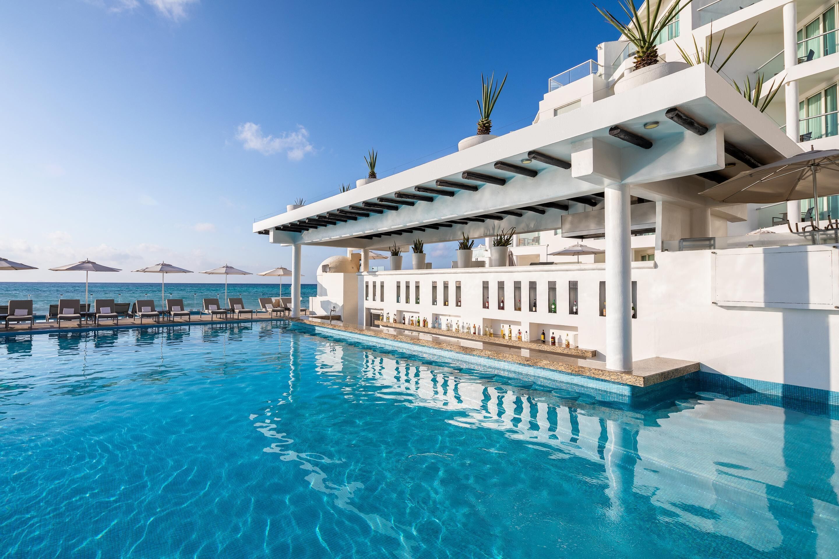 Outdoor pool, pool umbrellas, pool loungers