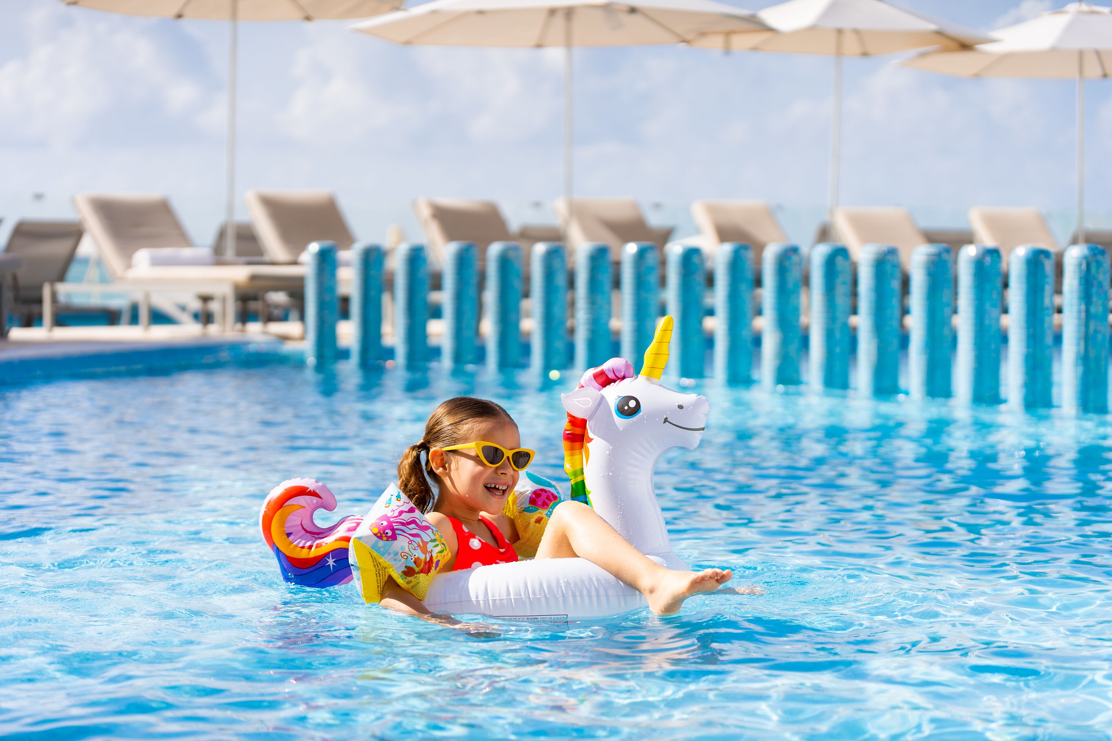 Outdoor pool, pool umbrellas, pool loungers