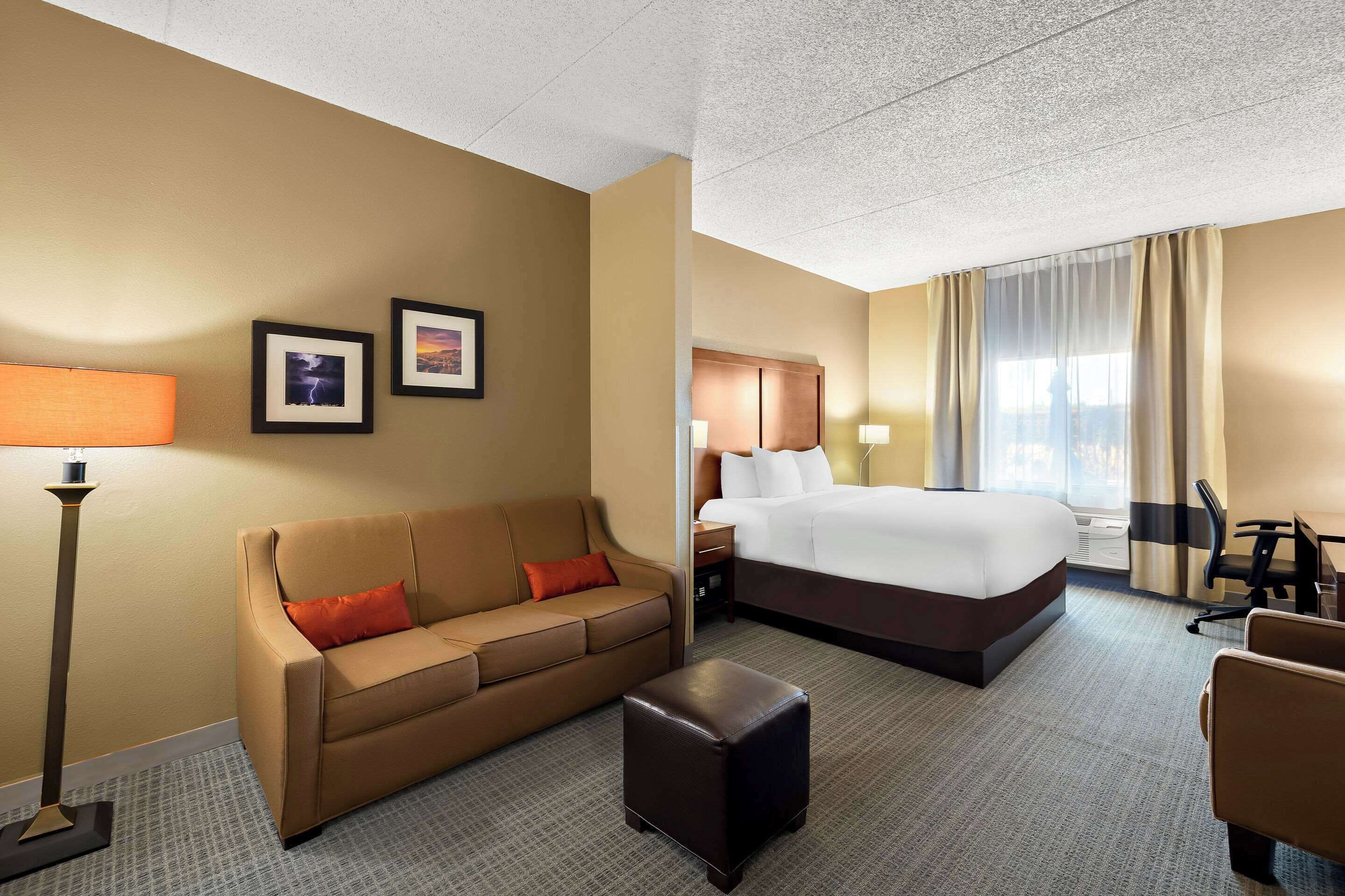 Desk, blackout curtains, iron/ironing board, rollaway beds