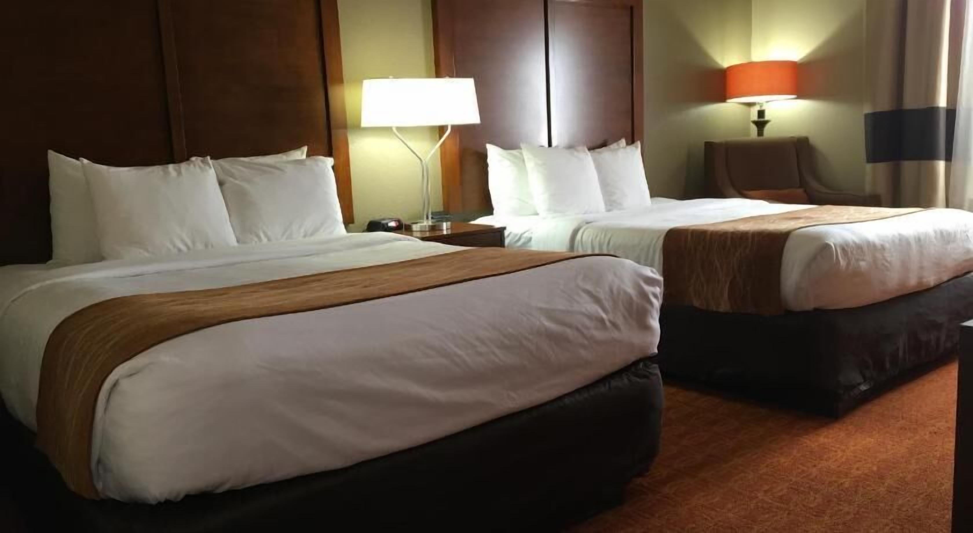 Desk, blackout curtains, iron/ironing board, rollaway beds