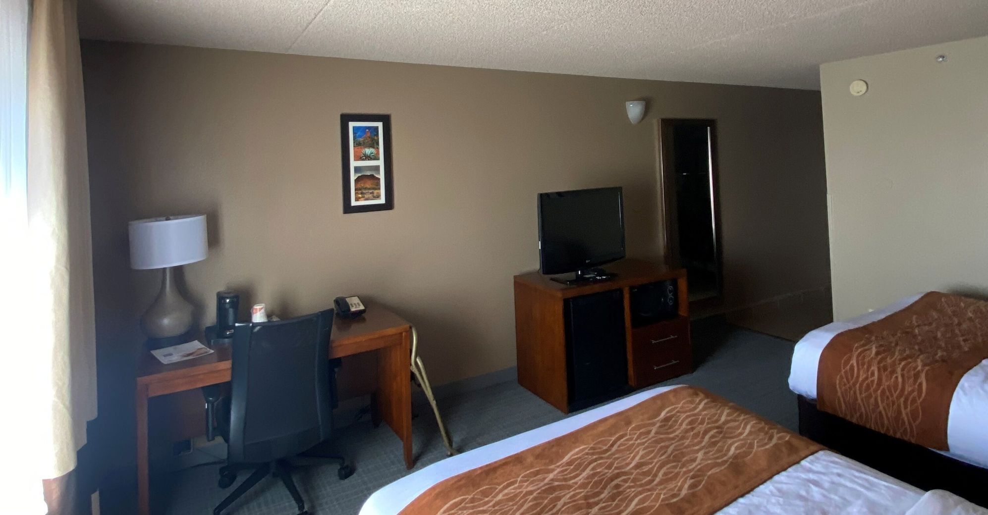 Desk, blackout curtains, iron/ironing board, rollaway beds