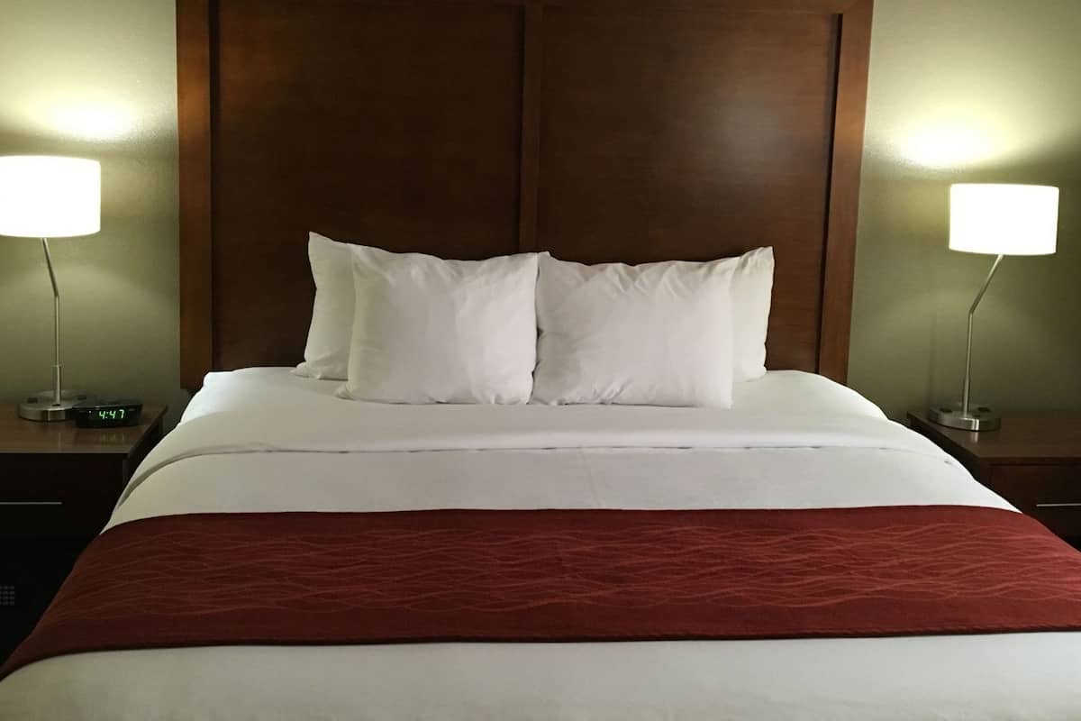 Desk, blackout drapes, iron/ironing board, rollaway beds