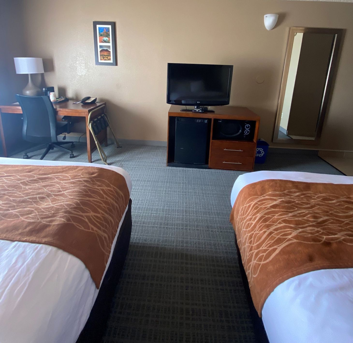 Desk, blackout curtains, iron/ironing board, rollaway beds