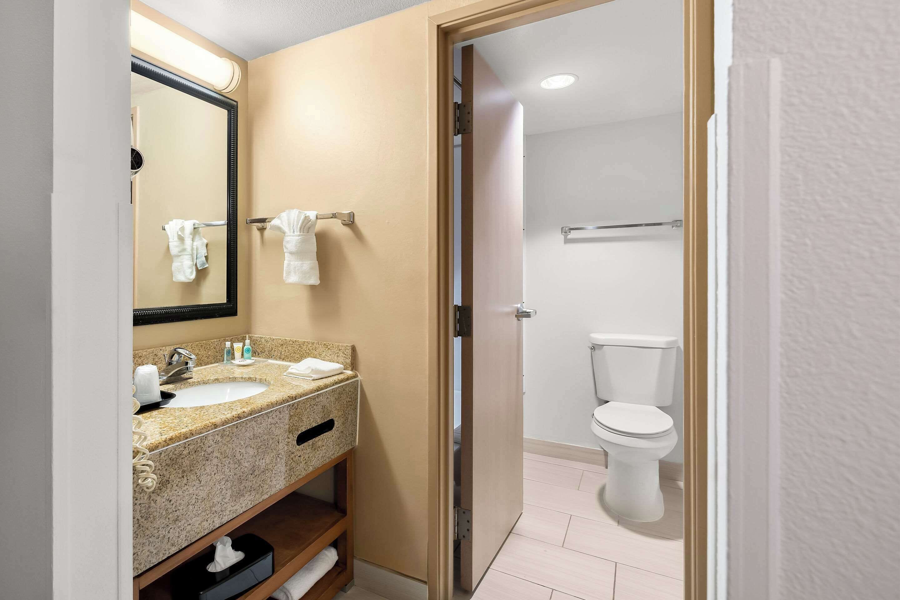 desk, blackout curtains, iron/ironing board, rollaway beds