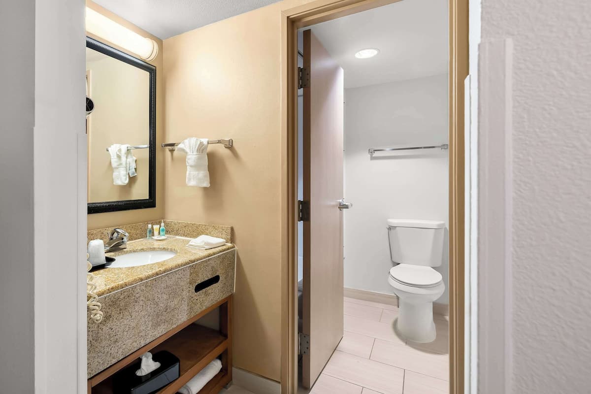 desk, blackout curtains, iron/ironing board, rollaway beds