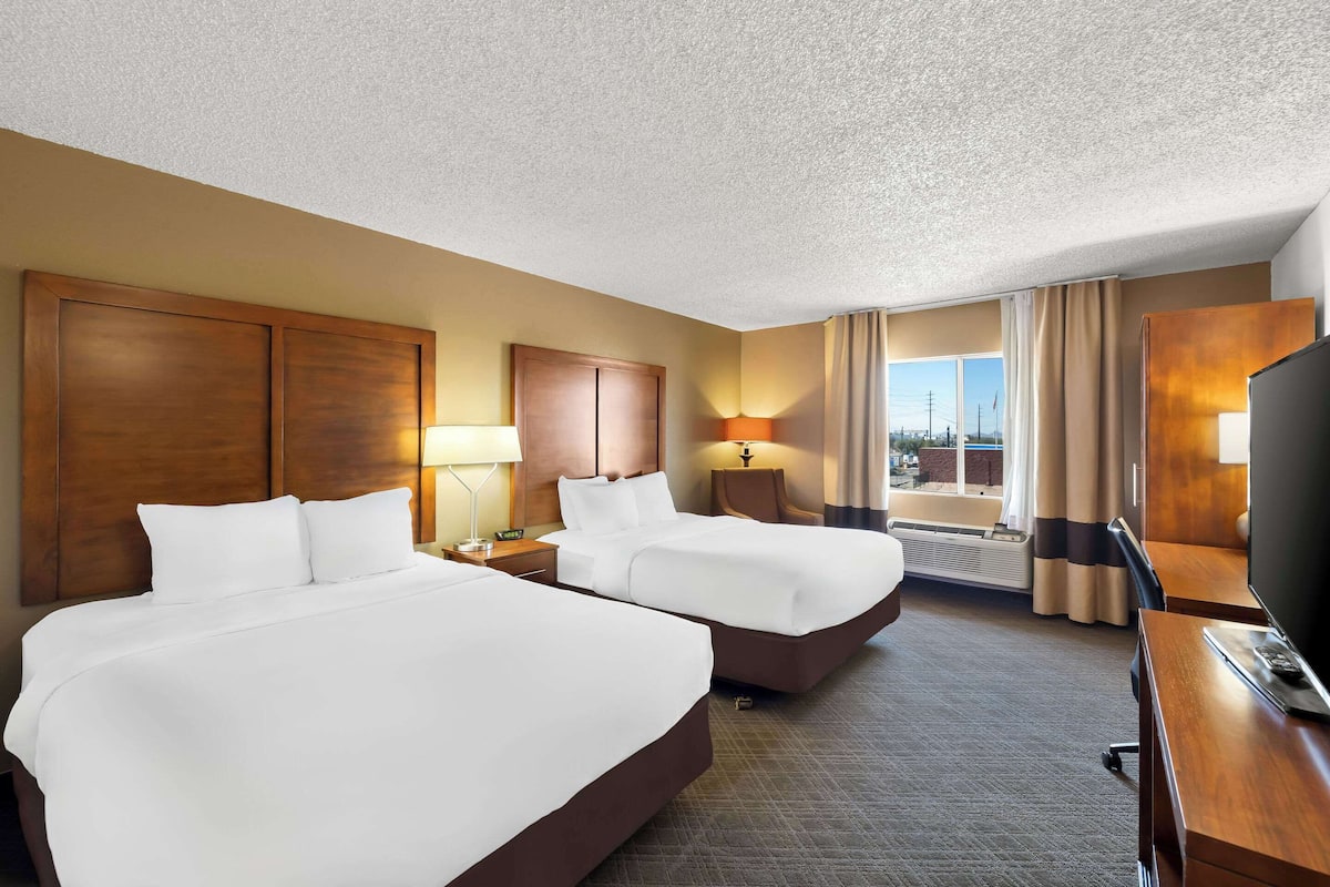 desk, blackout curtains, iron/ironing board, rollaway beds