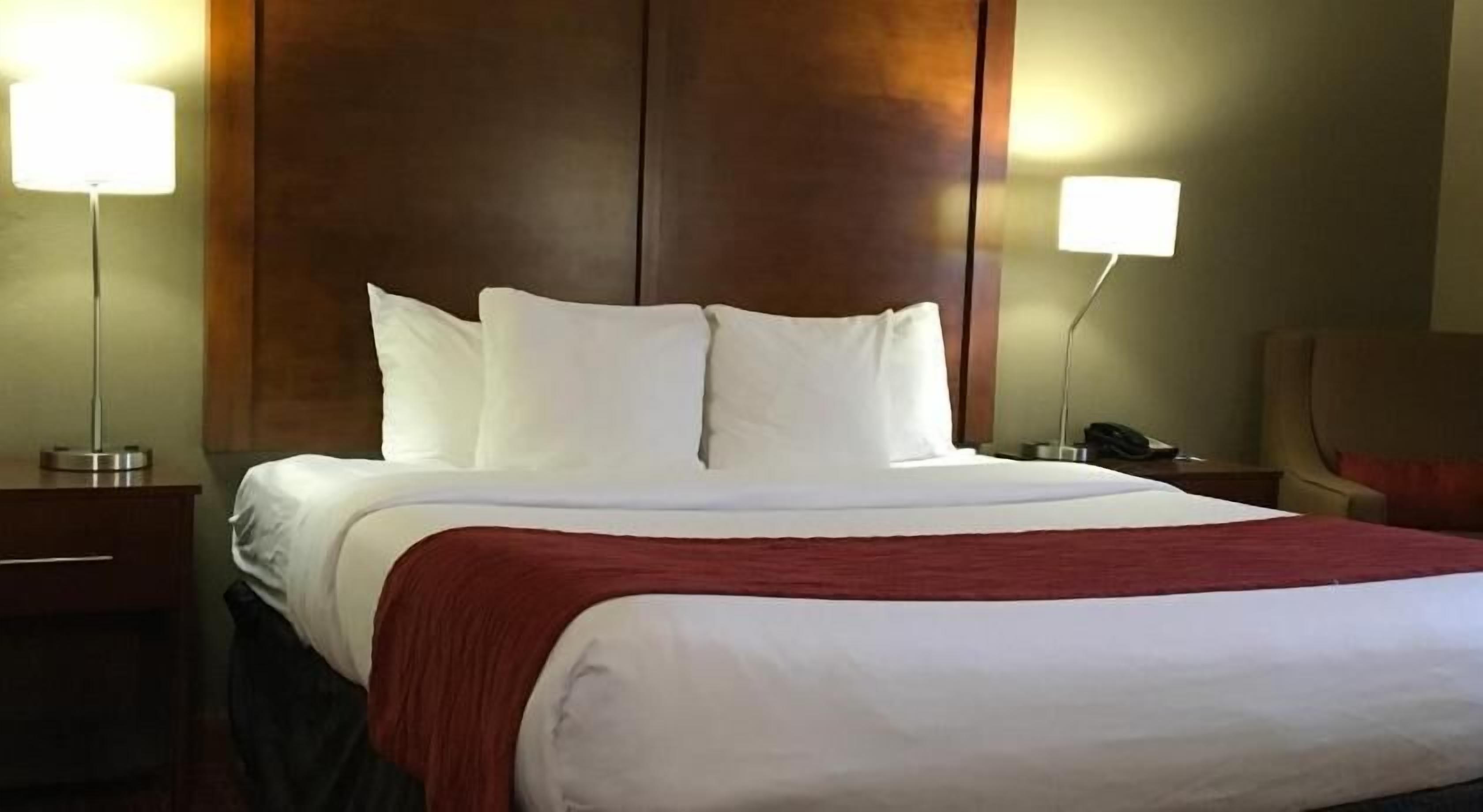 Desk, blackout curtains, iron/ironing board, rollaway beds