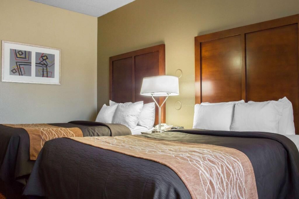 Desk, blackout curtains, iron/ironing board, rollaway beds