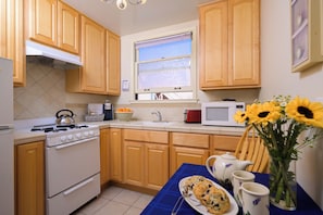 Fridge, microwave, coffee/tea maker, highchair