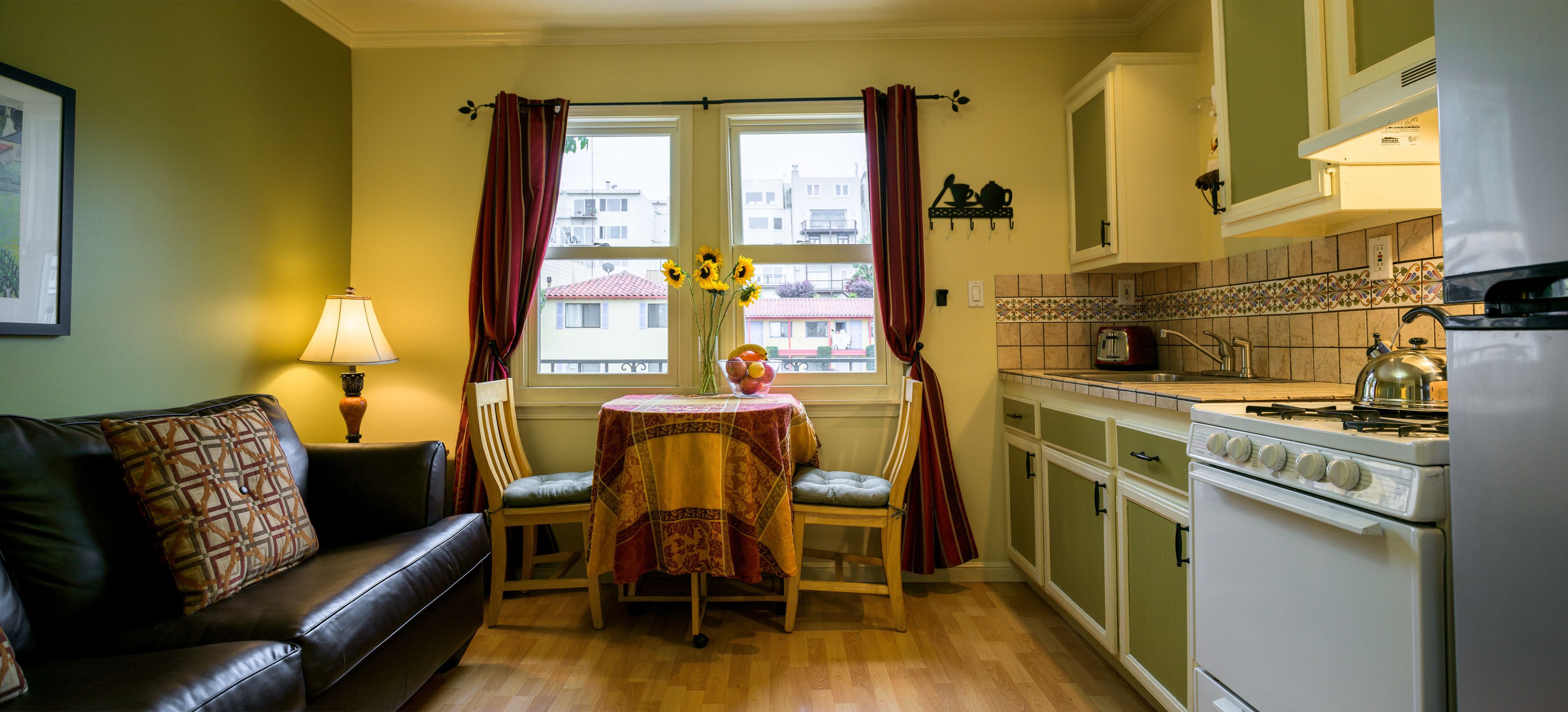 suite, 1 bedroom, kitchen, city view | living room | flat-screen tv, toys