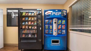 A vending machine area with a Pepsi dispenser and a snack vending machine. - Extended Stay America Suites Toledo Holland (Holland)