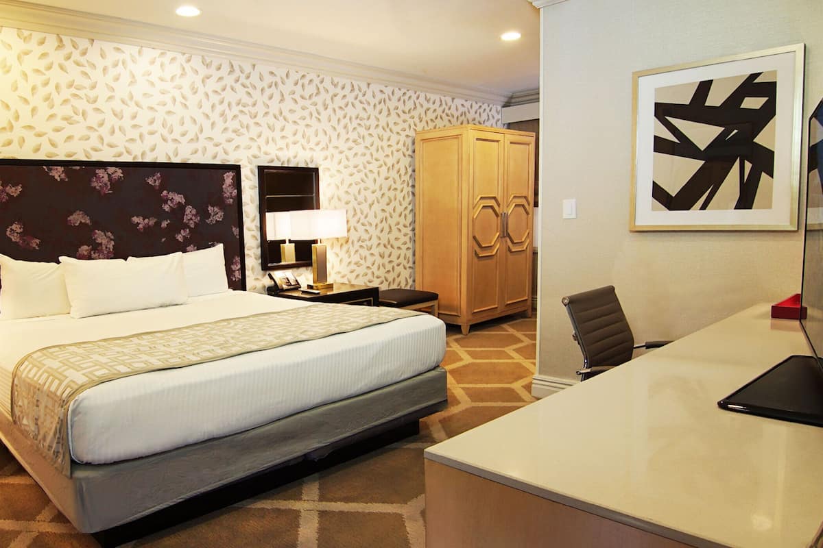 In-room safe, blackout curtains, iron/ironing board, cots/infant beds