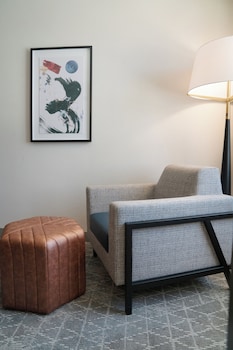 Deluxe Room, 1 King Bed, Non Smoking | In-room safe, blackout drapes, iron/ironing board, cribs/infant beds at Gold Coast Hotel and Casino